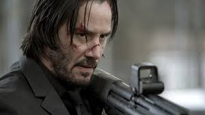Keanu Reeves como John Wick em cena promocional da franquia