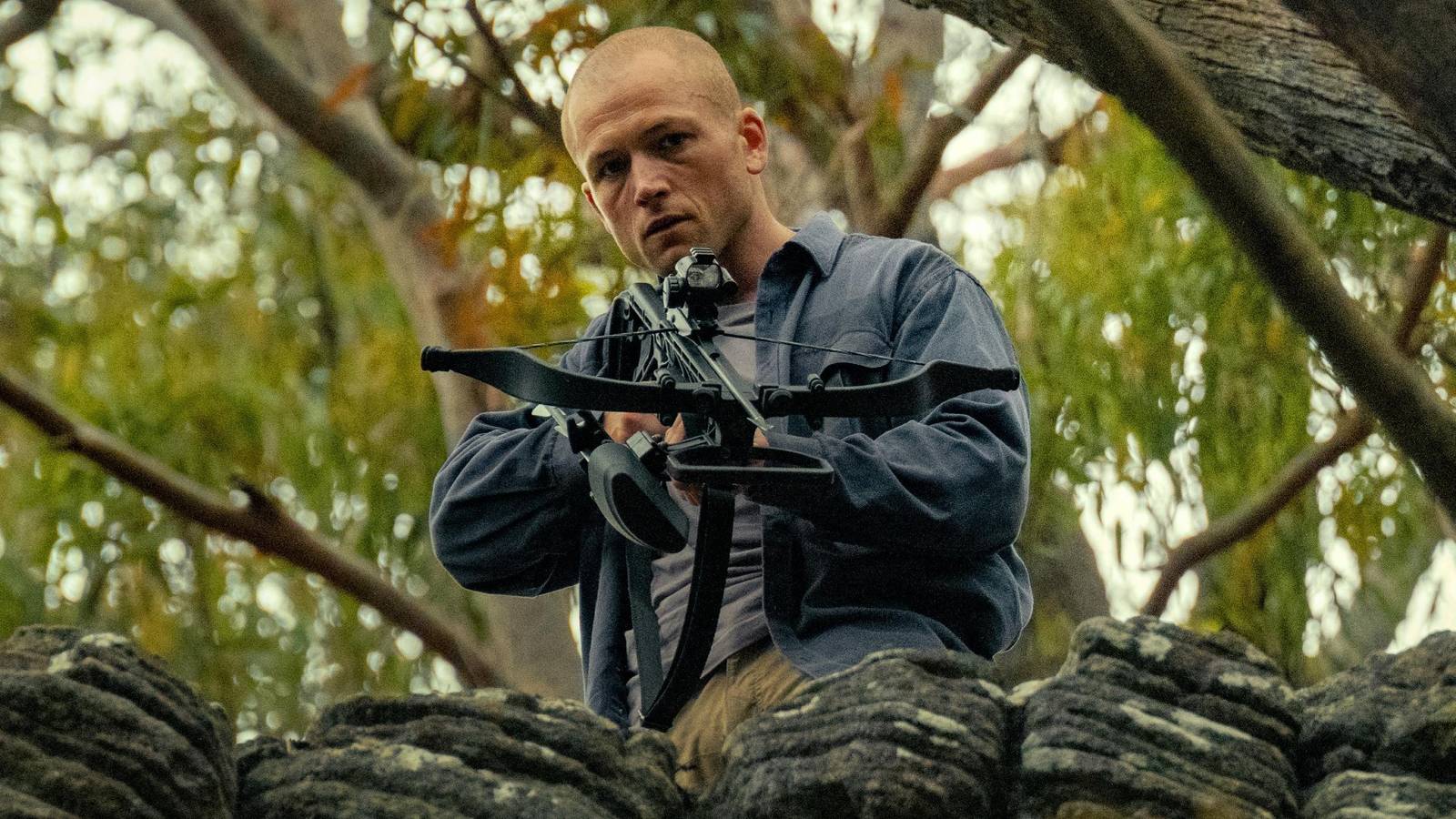 Taron Egerton como Ben em O Jogo do Predador